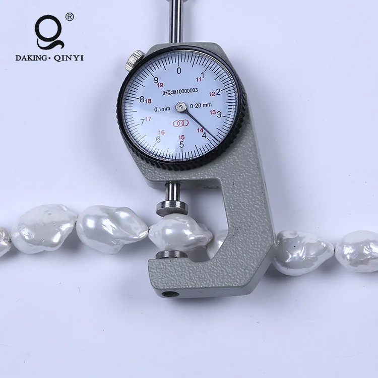 

Wholesale White Nucleated Plated Natural Big Baroque Pearl Strands