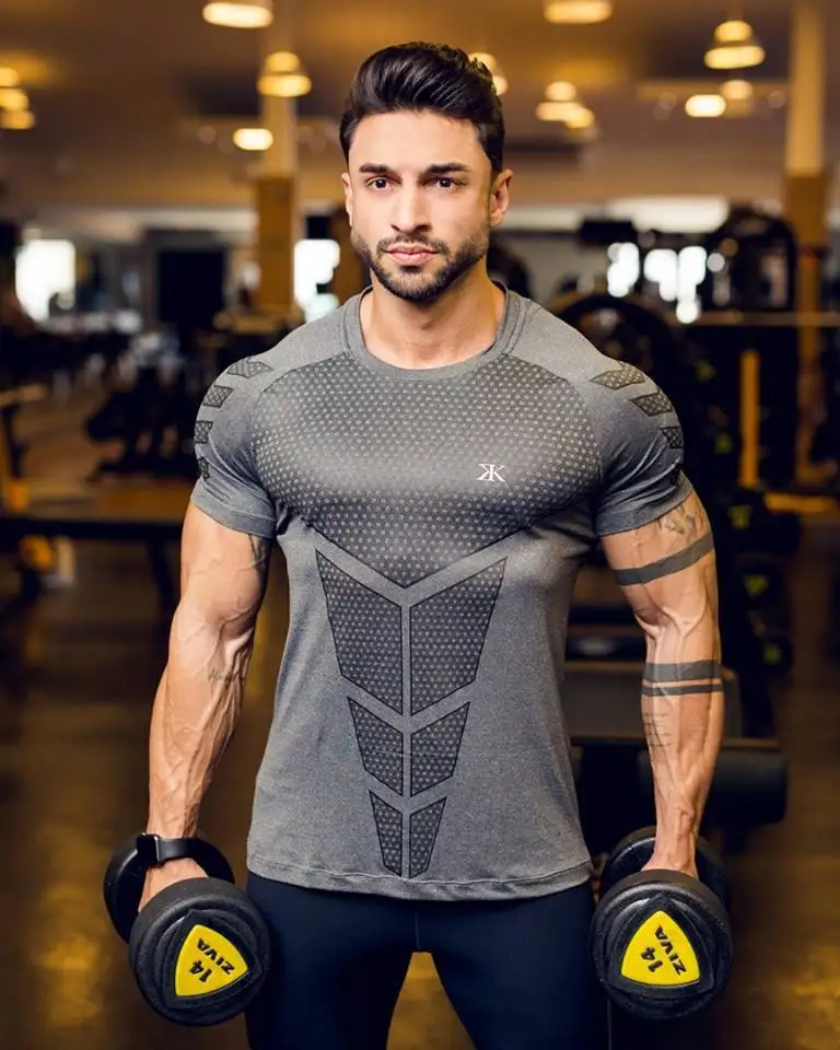 

Muscle men summer gyms Fitness Bodybuilding tight Short Sleeve t shirt male sporting Brand Tees Tops fashion Casual clothing
