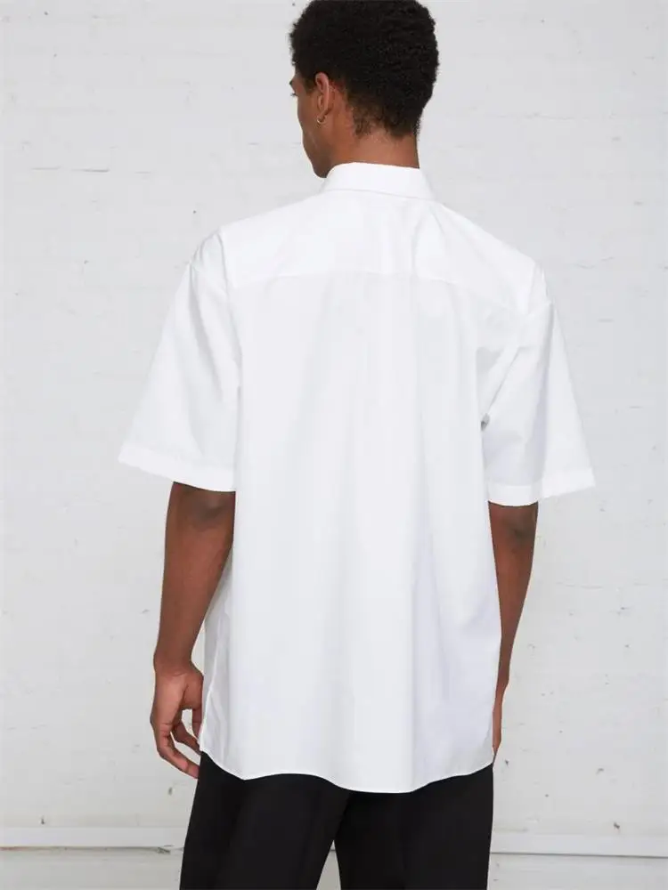 Белая хлопковая рубашка на бретелях с короткими рукавами и острым воротником в