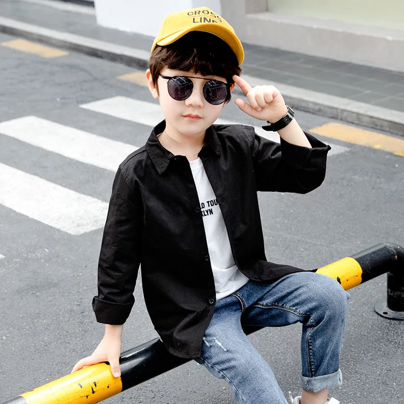 

Boys long-sleeved white shirt 2021 spring and autumn big children's solid color lapel children's leisure