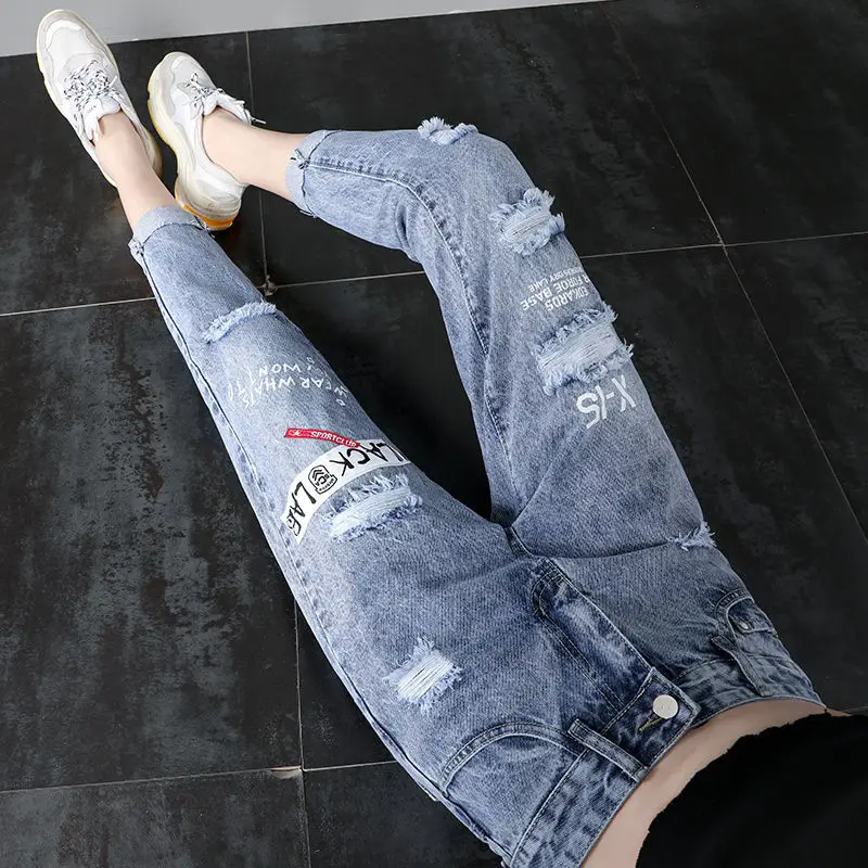

Holed jeans women's spring and autumn 2021 new loose and thin high waist beggar Harun Capris women's pants