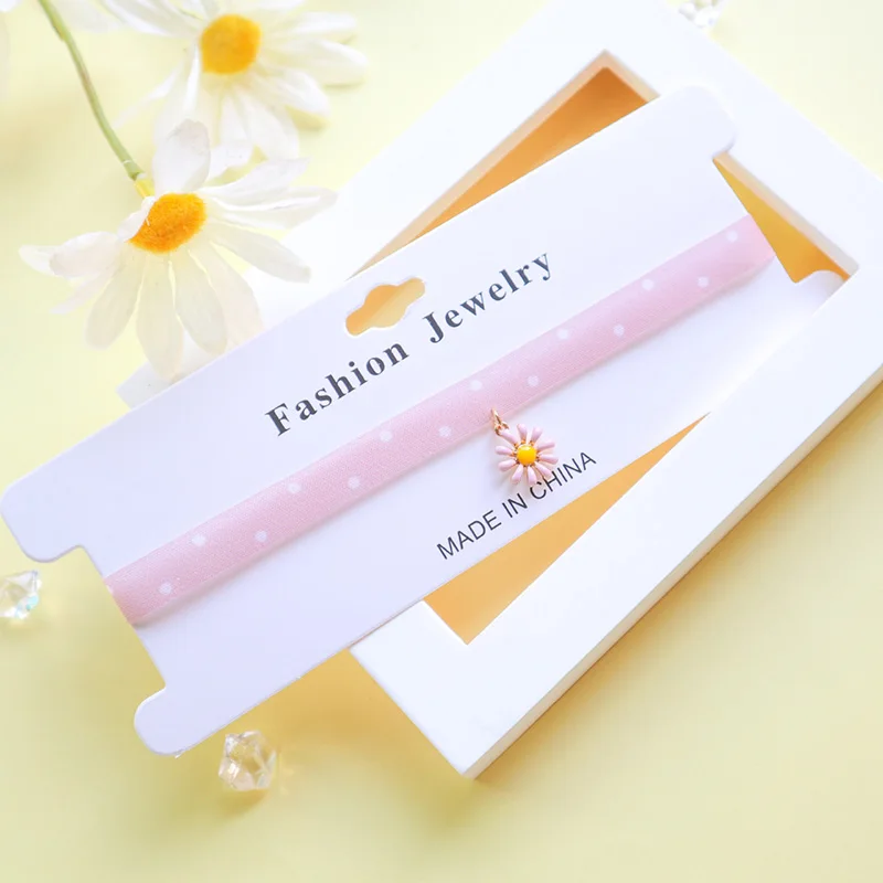 Женское колье-чокер в горошек с подвеской виде цветка | Украшения и аксессуары