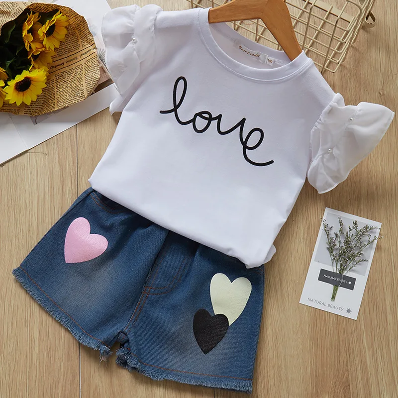 

Kids Baby Girls Fashion 2-piece Valentine's Day Outfit Set Fly Sleeve Letter Print Tops Heart Print Denim Shorts Summer Set