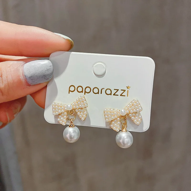 

Korean Pearl Pendant 925 Silver Needle Temperament Small Fresh Bow Simple Fashion Earrings Female