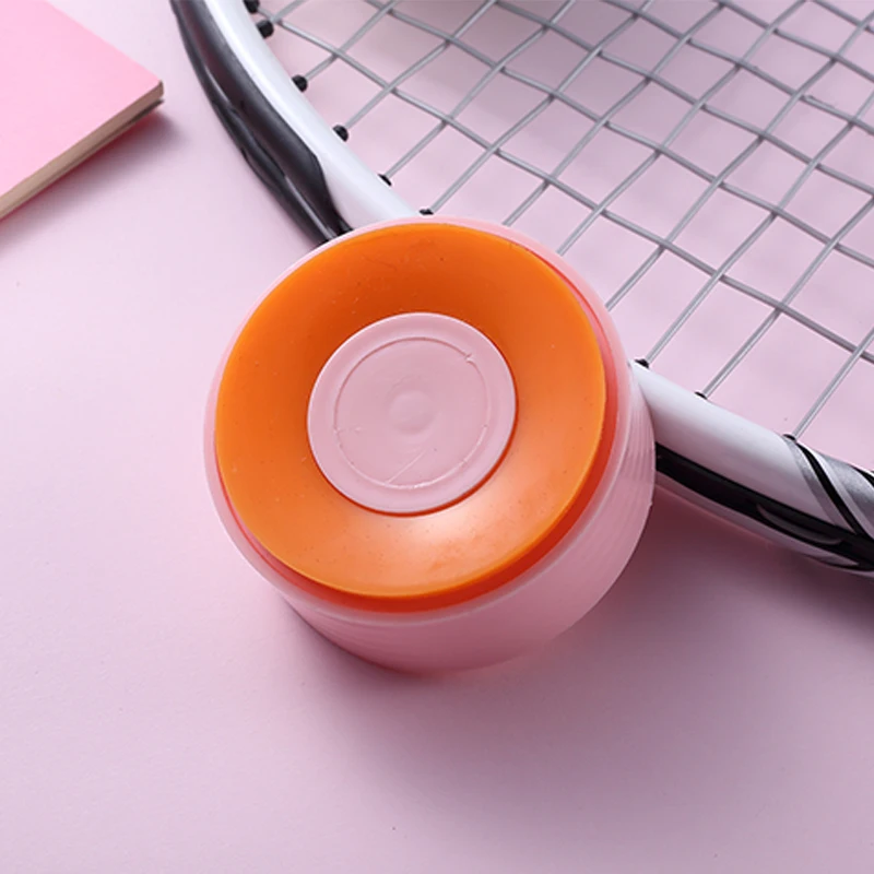 Розовое стекло которое можно использовать в качестве держателя для мобильного