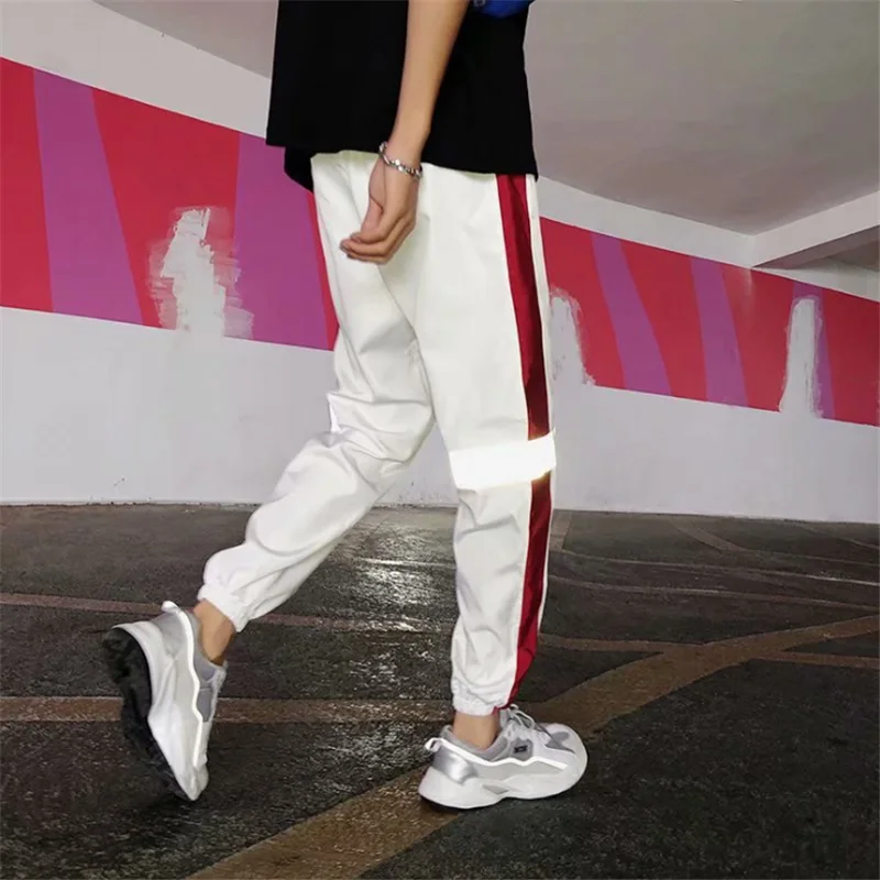 

2021 Men Streetwear Reflective Joggers Pants Man Korean Fashion Hip Hop Sweatpants Couple Side Striped Trousers 5XL