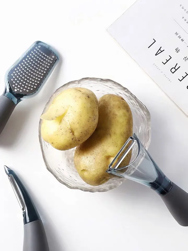 

Creative Stainless Steel Peeler Vegetable Scraping Planer Potato Shredder Pizza Wheel Knife Cheese Grater Multi-purpose Tool Set