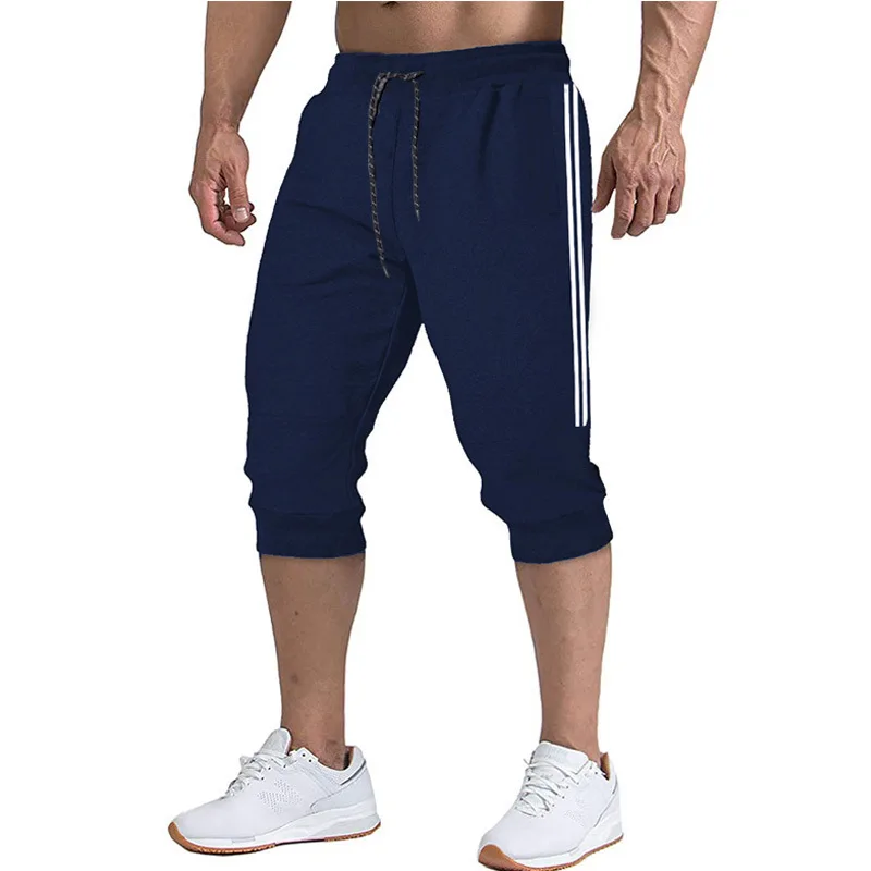 

he new summer men's seven - cent pants fashion slim sports pants breathable color casual pants men