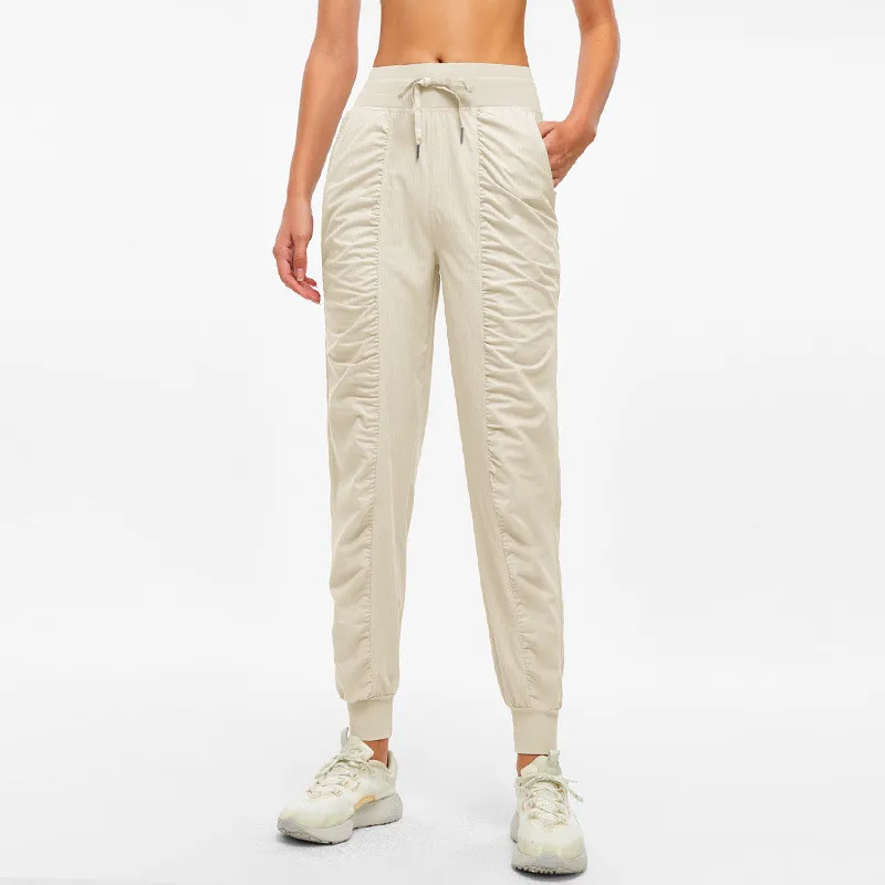 Women Sport Pants Fitness Yoga Legging Natural Folds Quick-drying And Breathable Drawstring Feet Loose Trousers With Pocket