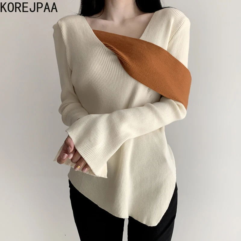 

Свитер женский трикотажный асимметричный с V-образным вырезом и длинными рукавами