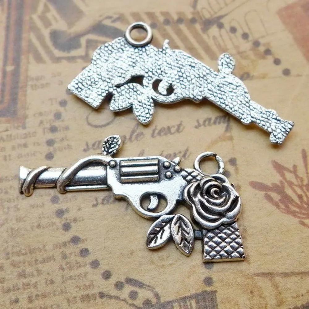 

100 шт пистолет амулеты 31 мм x 19 мм DIY ювелирных изделий Кулон Античный серебряный цвет