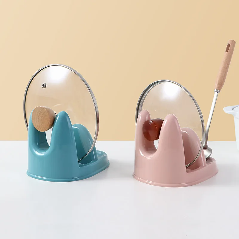 

A kitchen for storing spoons, chopping boards, pots and pans