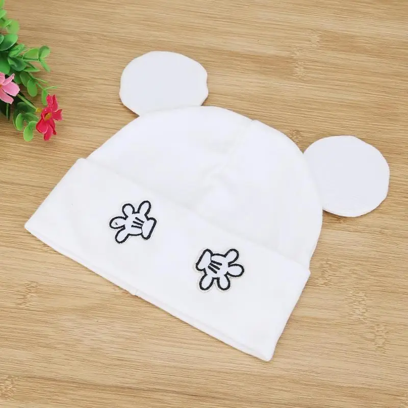 Чепчик для новорожденного вязаный унисекс шапка с загнутыми полями стильная