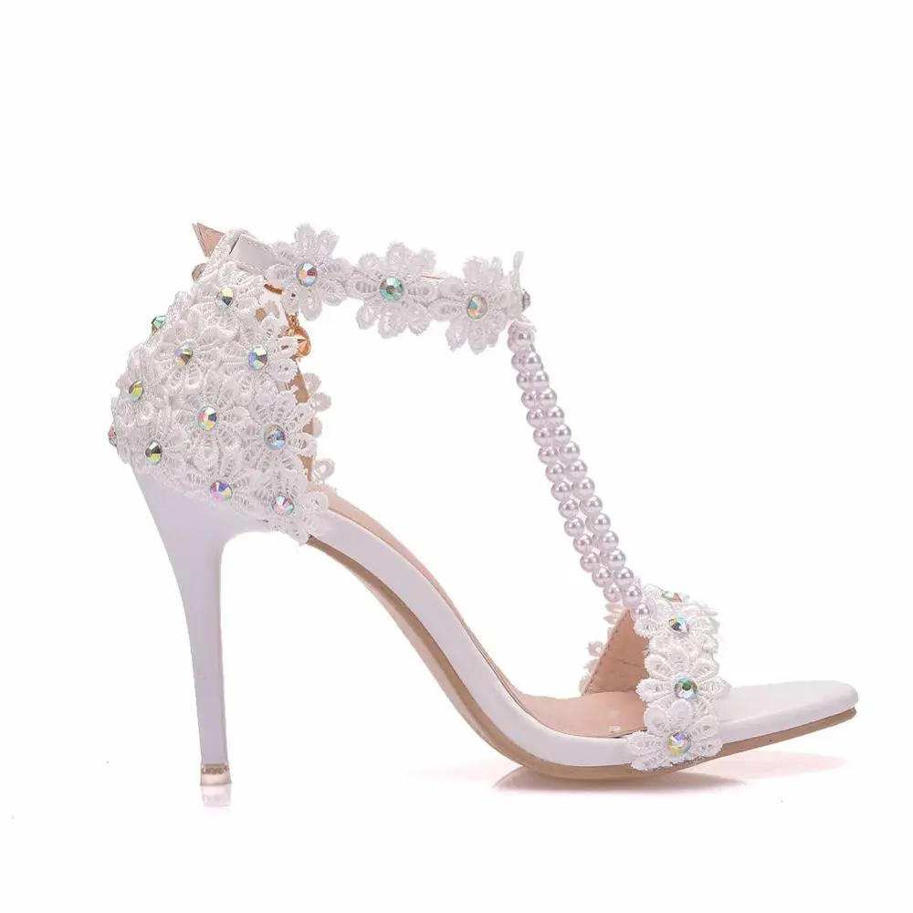 

Crystal Queen Women Sandals White Lace Flowers Pearl Tassel Bridal 9cm Heel Fine High Heels Slender Bridal Pumps Wedding Shoes