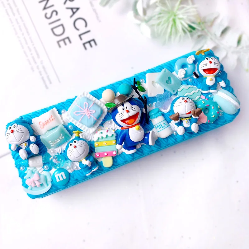 

Cream glue pencil case Doraemon diy set net celebrity self-made pencil case finished product student boy girl Stationery box