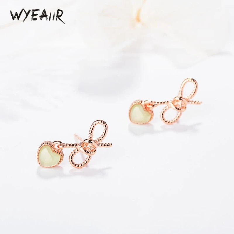 

WYEAIIR Heart-shaped Hollowed Bow Opal Sweet Fresh Literary Creative 925 Sterling Silver Female Stud Earrings