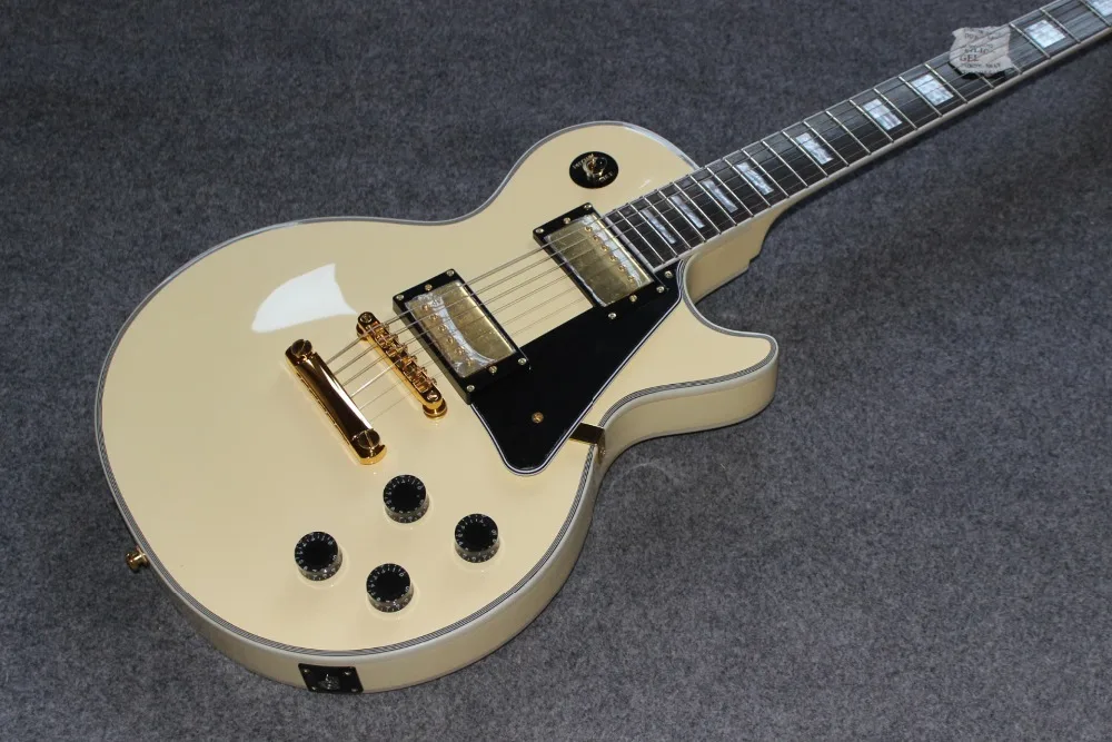 

Custom shop.custom electric guitar.cream color top guitarra.Rosewood fingerboard,black pickguard gitaar