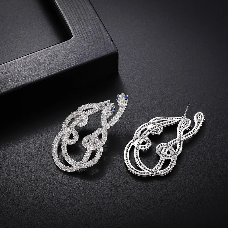 

High-grade zircon earrings cross-border exaggerated snake earrings animal earrings shine double snake surround earrings earrings