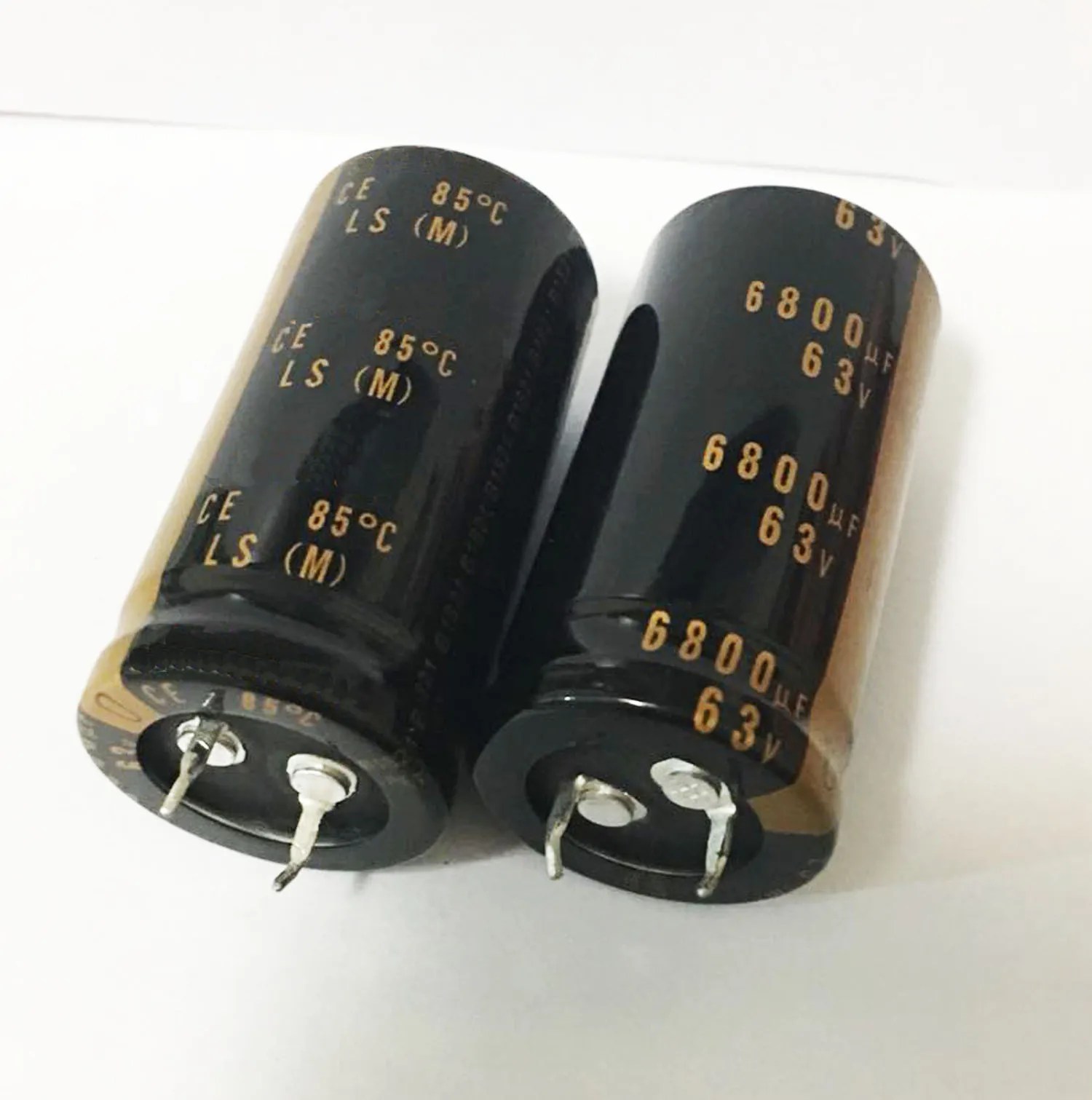 Конденсатор 400v 10mf. Конденсатор 63в. Конденсатор 3300 16v. Конденсатор 63в. Конденсатор 63в.