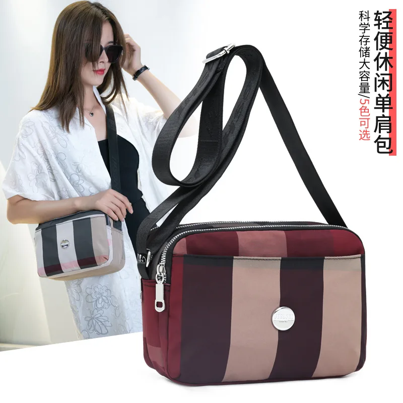 

Простая модная трендовая дамская сумка-мессенджер на плечо, легкая водонепроницаемая нейлоновая сумка, вместительный женский рюкзак для п...