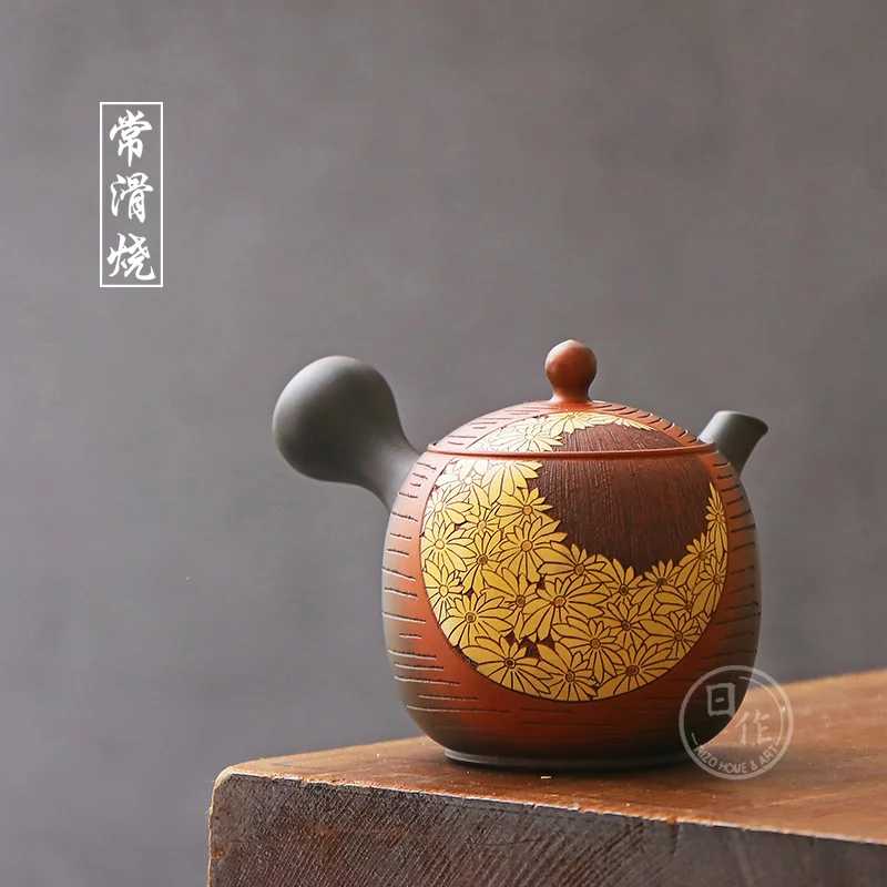 

burn imported from Japan side under the teapot's claim for chrysanthemum golden color emboss ceramic lasts a tea set
