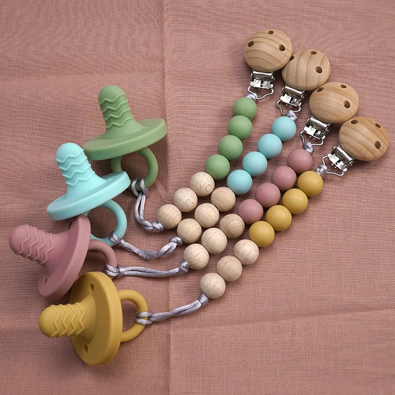 

Food Grade New Design Silicone Infant Teething Chain Solid Color Safety Baby Pacifier Clips Eco-friendly Newborn Teething Gifts
