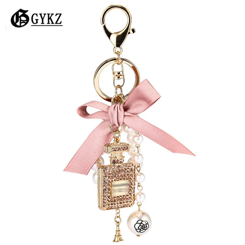 

Bows and Pearls Perfume Bottle Key Chains Accessories Zinc Alloy Luxury Women Bags Ornament Wholesale or Bulk Fashion Jewelry