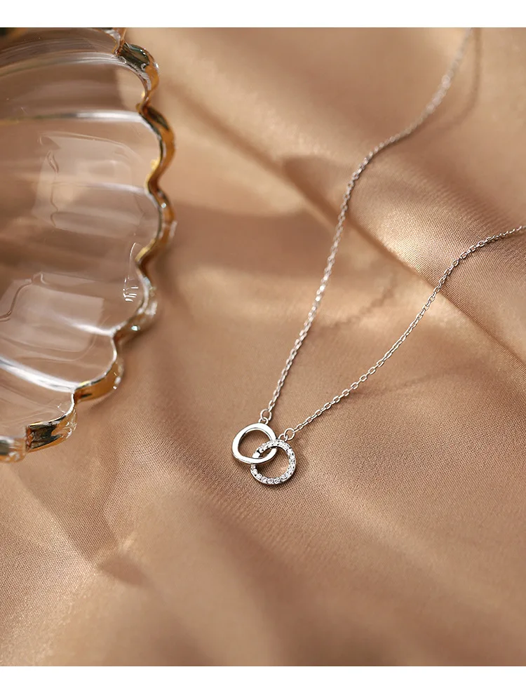 Ожерелье женское с двойным кольцом и прозрачными кристаллами - купить по