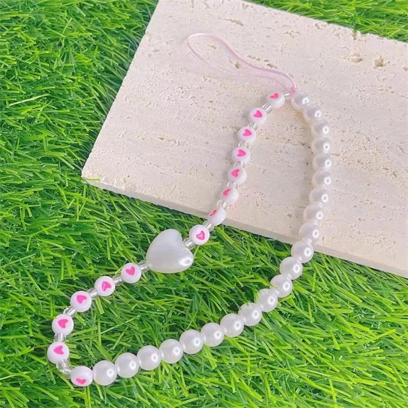 

Ins Charming Transparent Millet Beads Imitation Pearl Pink Heart-Shape Mobile Phone Chain Women's Anti-Lost Lanyard Jewelry Gift