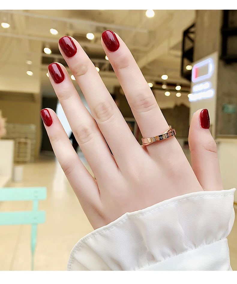 Женское кольцо с двойной петлей из титановой стали цвета розового золота |