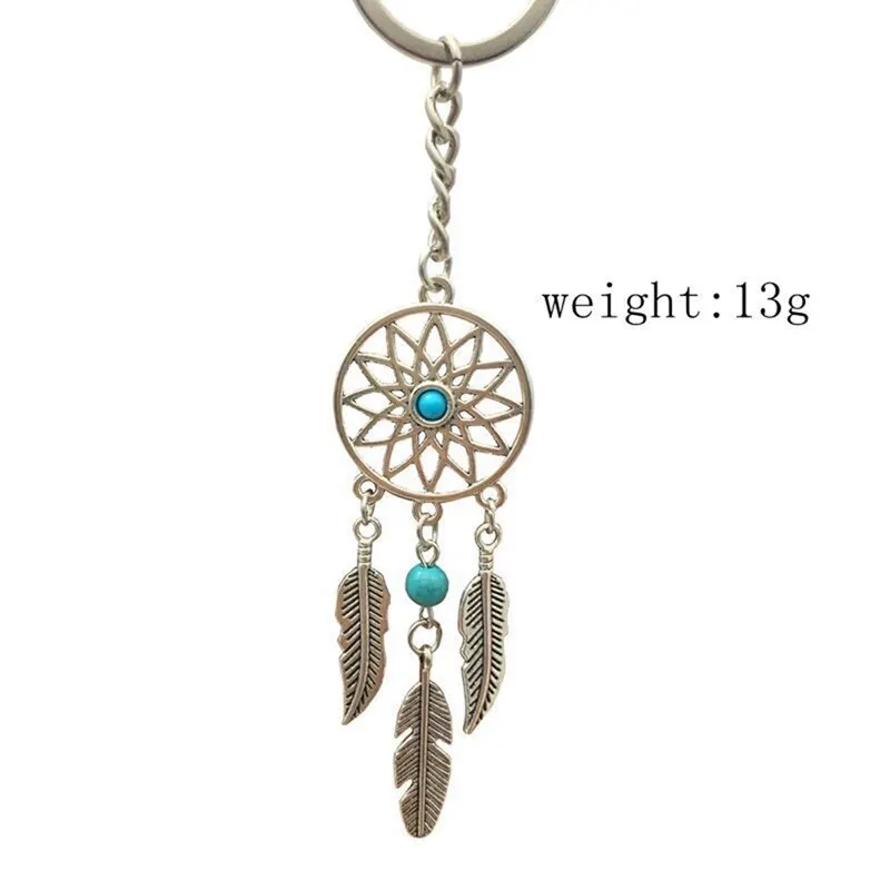 Брелок для ключей серебристого цвета кольцо с перьями и кисточками в стиле Ловца
