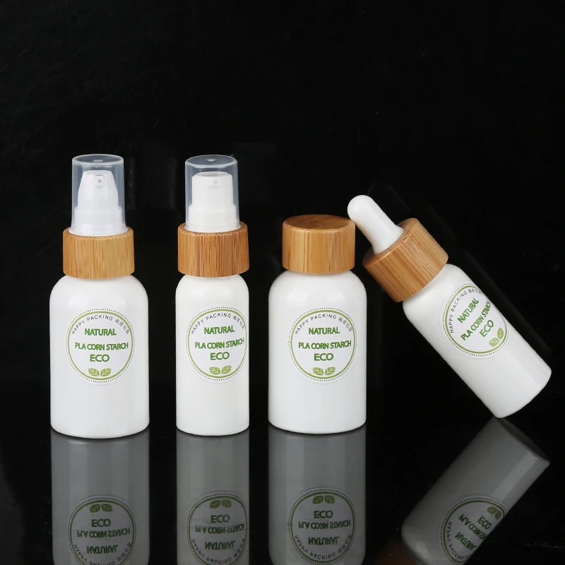 Customized Hot Sell White Porcelain Bottles Round Dropper Bottles With Bamboo Lid Cap Essential Oil Cosmetic Serum Containers