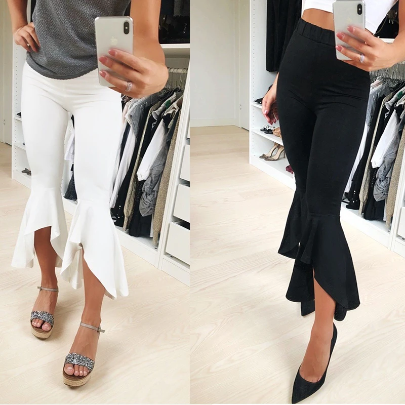 Брюки женские черные белые с оборками широкие подходят для повседневной носки |