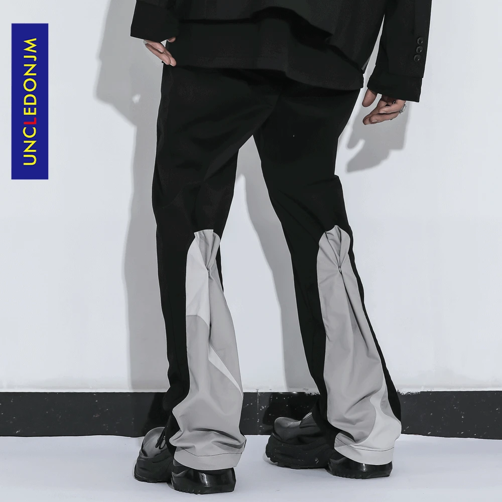 

UNCLEDONJM Color block patchwork casual pants men high street baggy pants button design flared pants harem pants 21029