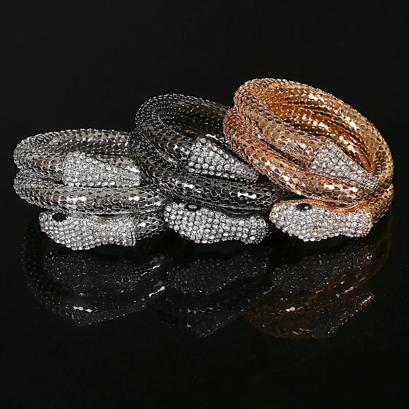 Женский браслет со змеиным плетением золотистый и серебристый на спирали в