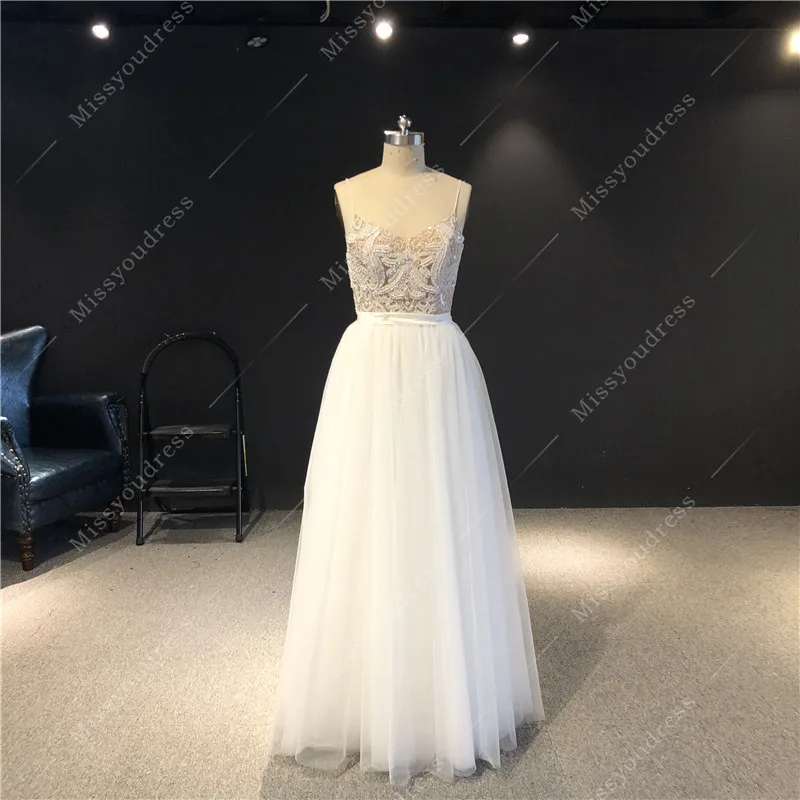 

Real Pictures Newest High Quality Customized Ivory Tulle V-neck Sleeveless Heavy Beadings A-line Floor Length Wedding Dresses