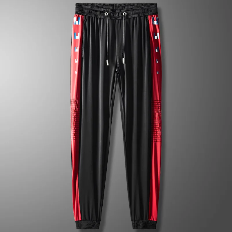 

Summer ice silk quick drying pants elastic thin Korean slim print air conditioning pants youth sports leisure pants men's pants