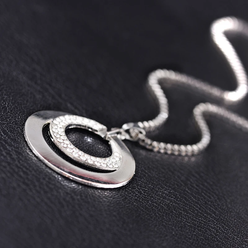 Женское длинное ожерелье со стразами серебряное с двойным кольцом подвеской|circle