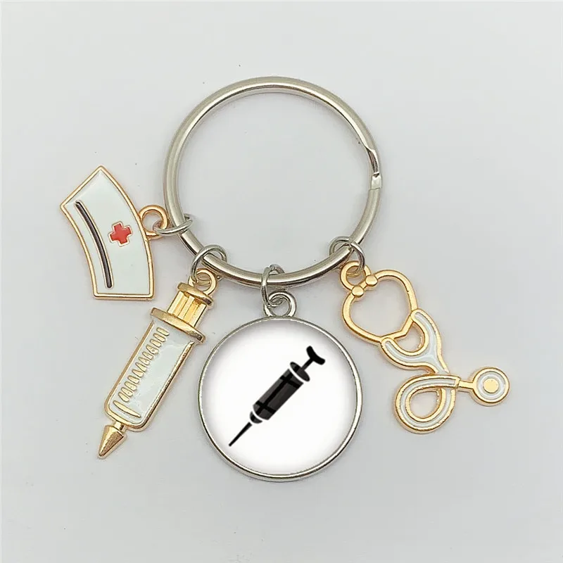 

New fashion creative nurse medical syringe stethoscope image keychain glass cabochon and glass dome key ring pendant gift