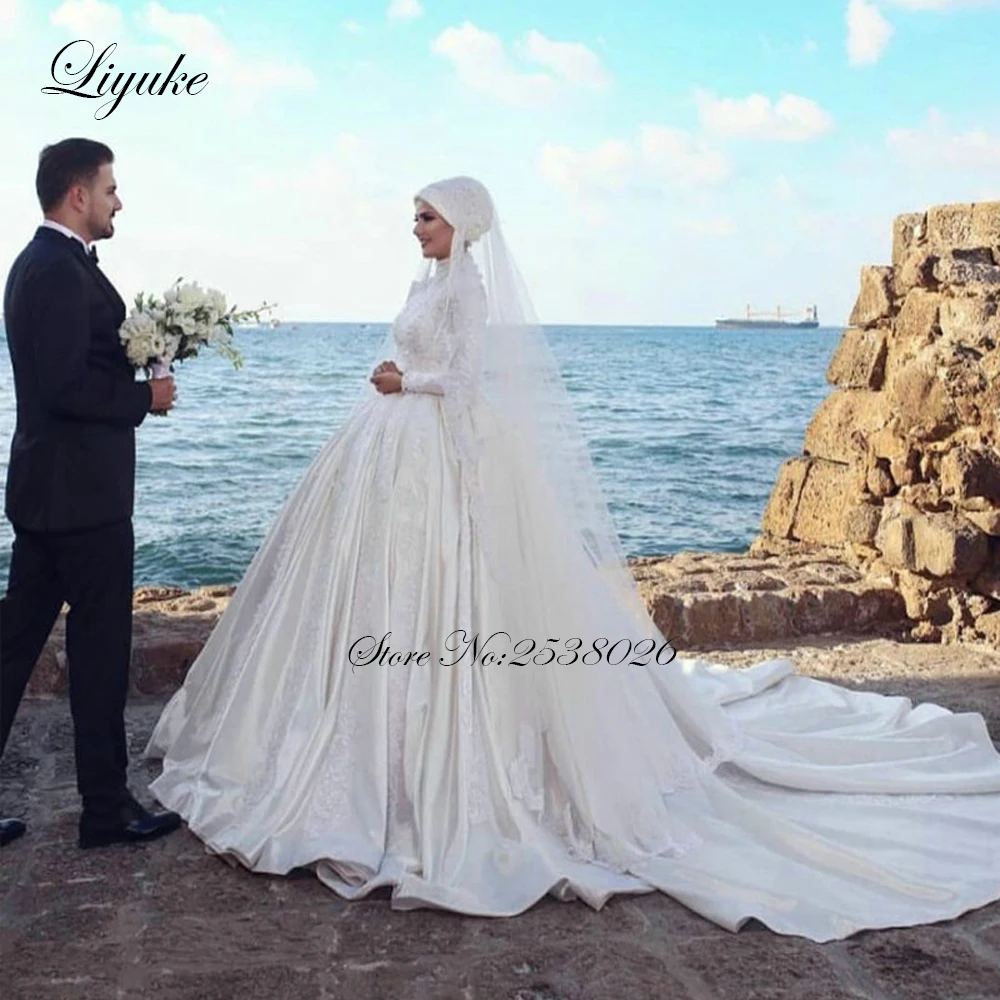 

Liyuke Gorgeous Ball Gown Muslim Wedding Dress With Long Sleeve Arabic Bridal Wedding Gown With Royal Train