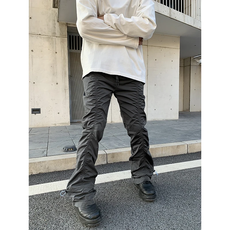 

European and American street fashion high street style folds drawstring slim flared pants men's street casual trousers