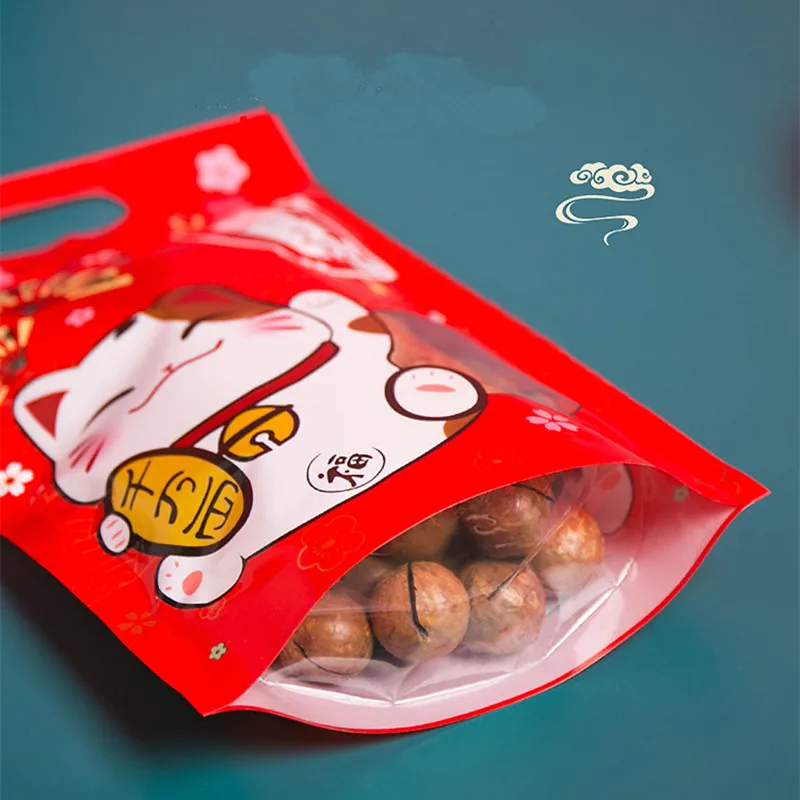 

100pcs High quality cartoon lucky cat nougat snowflake crisp seal bag dried fruit plastic bag zipper packaging tote bags