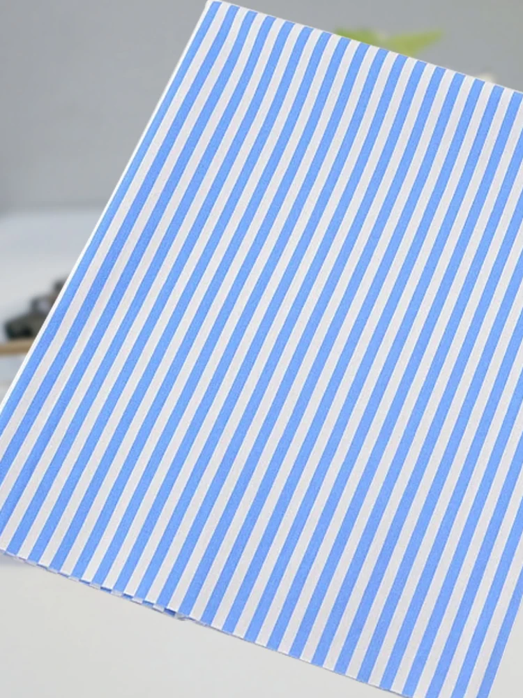 Хлопчатобумажная ткань с принтом в синюю полоску саржевая четверть жира