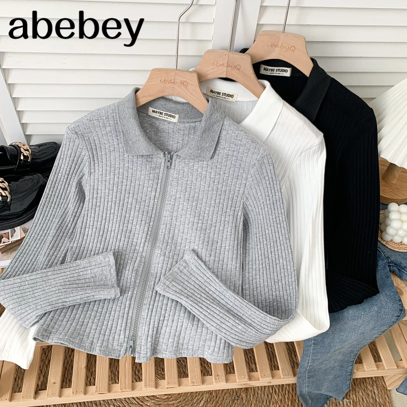 

Модная футболка с отложным воротником и длинным рукавом на молнии, короткая Однотонная футболка в Вертикальную Полоску с высокой талией, то...