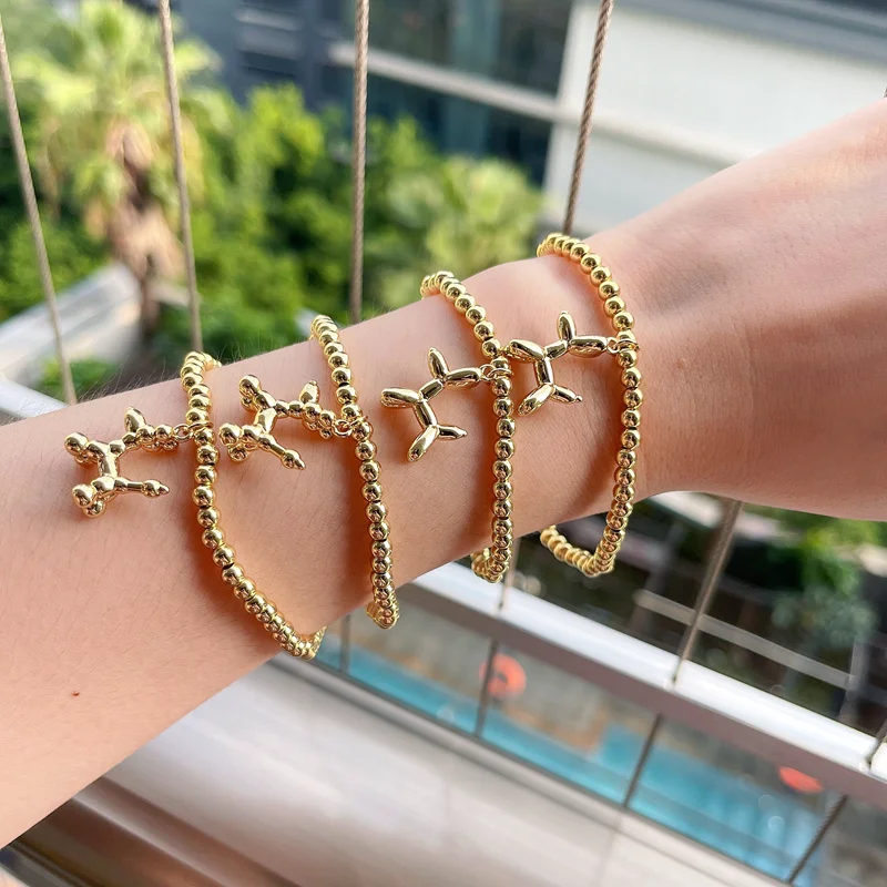 

10 шт. милый стиль воздушный шарик собака эластичный браслет Удачи Круглый бисер позолоченный Шарм браслет для женщин модные ювелирные изде...