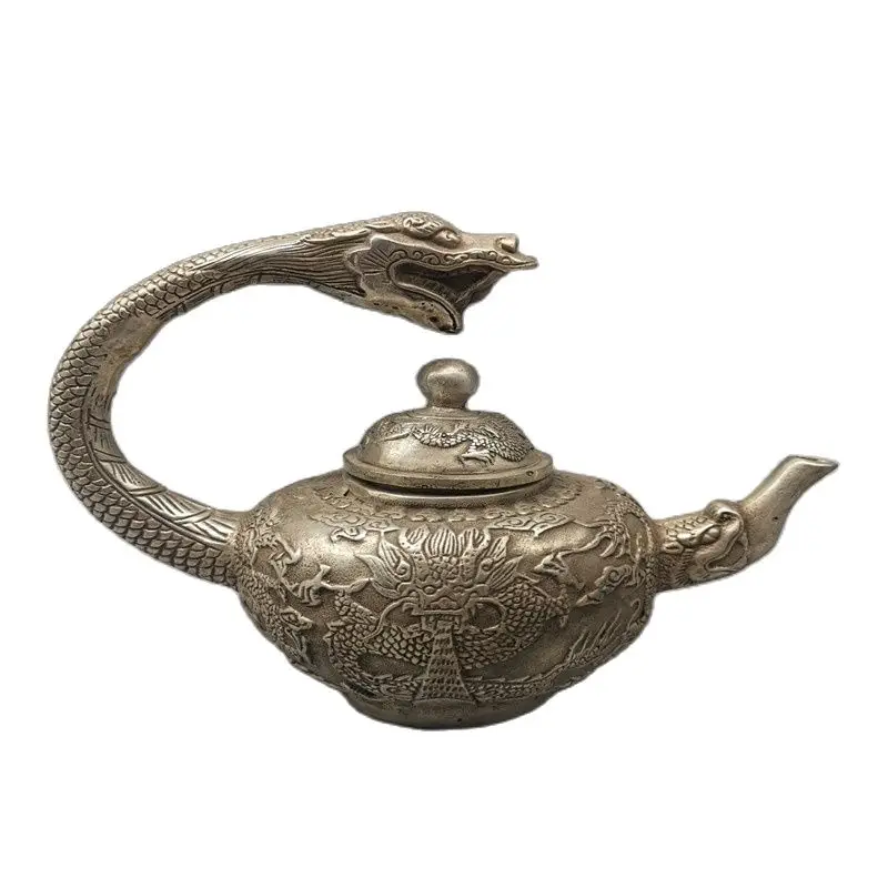 

Chinese Old Tibet Silver Carving Dragon Pot