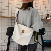 2022 new one shoulder ins canvas bag lovely girl student one shoulder dumpling bag female messenger bag female pendant handbags