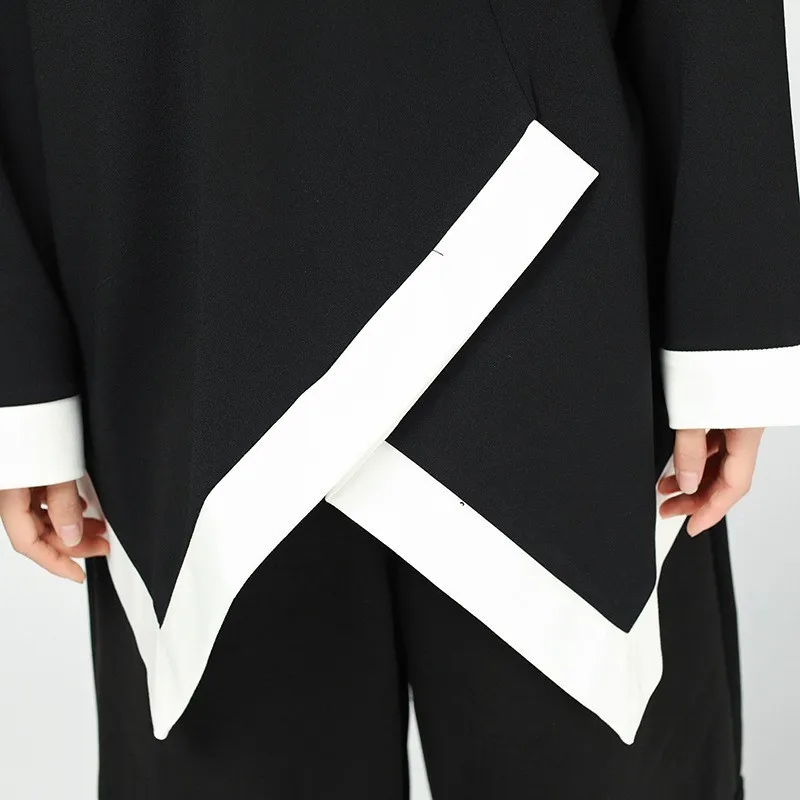 Женская футболка с круглым вырезом рукавом летучая мышь и асимметричным подолом