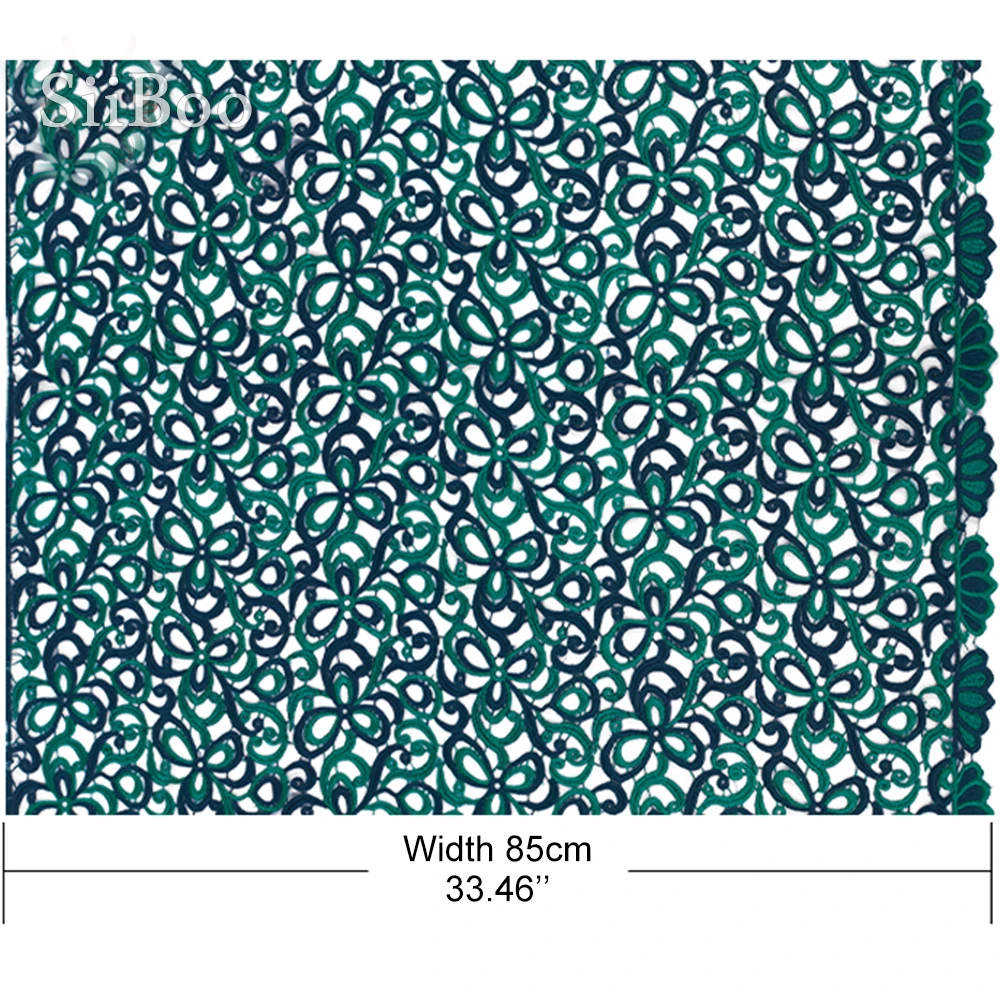 Дизайнерское темно зеленое объемное гипюровое кружевное платье с цветочной