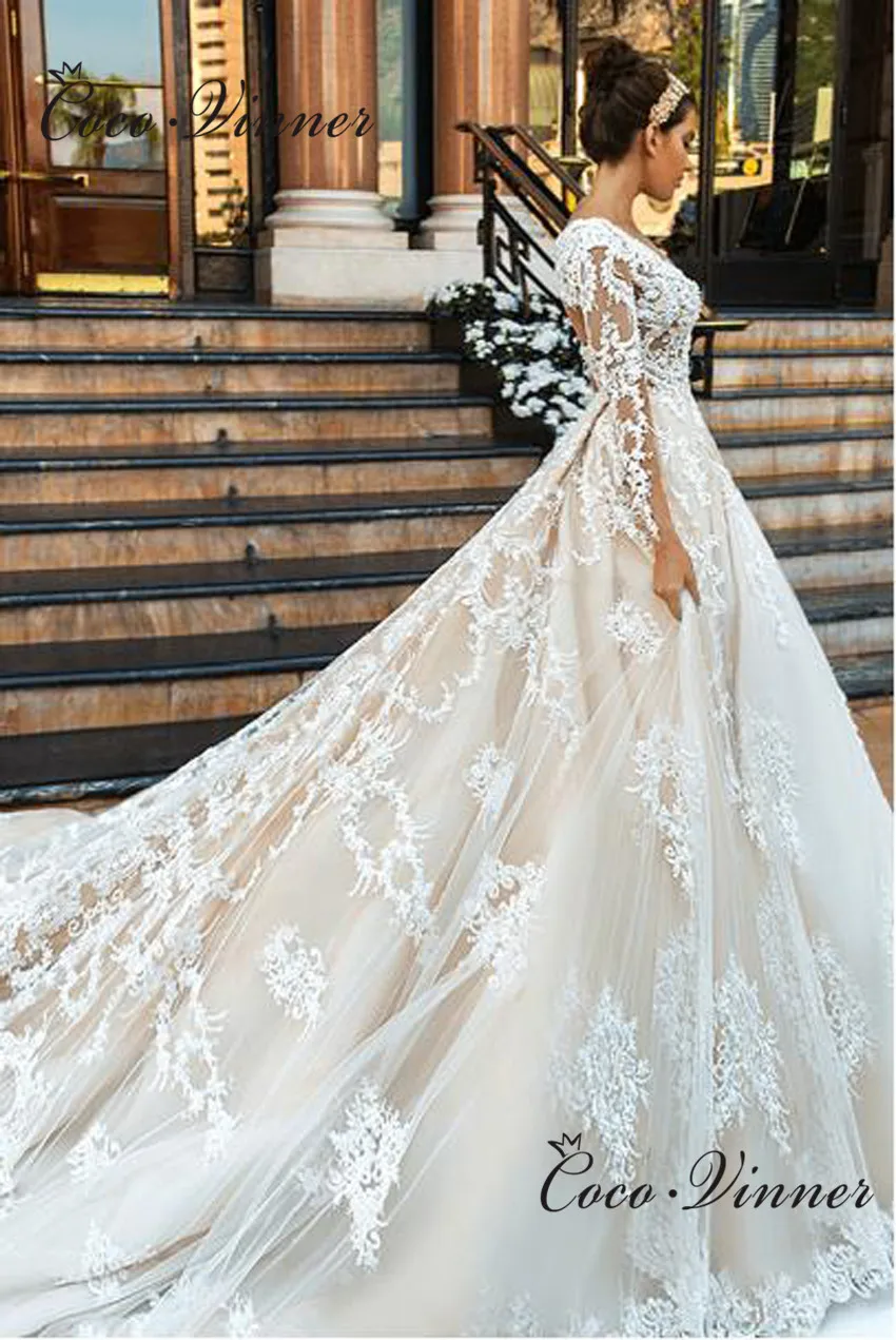 

Vintage Lace Appliques Dubai Wedding Dress New V neck 3/4 Sleeves Sexy Illusion Ball Gown Bohemian wedding dress W0510